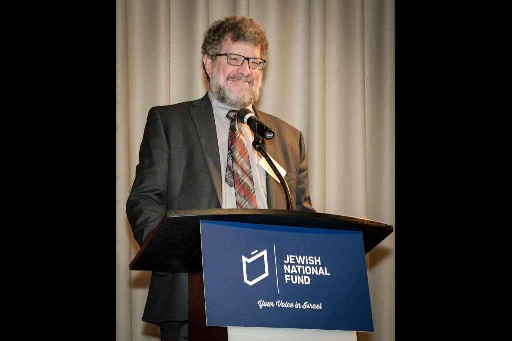 Dr. Ari Sacher