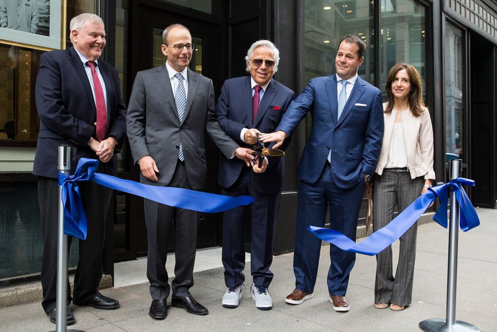 Robert Kraft, center