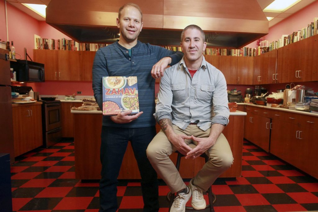 Steve Cook, left, with business partner Michael Solomonov