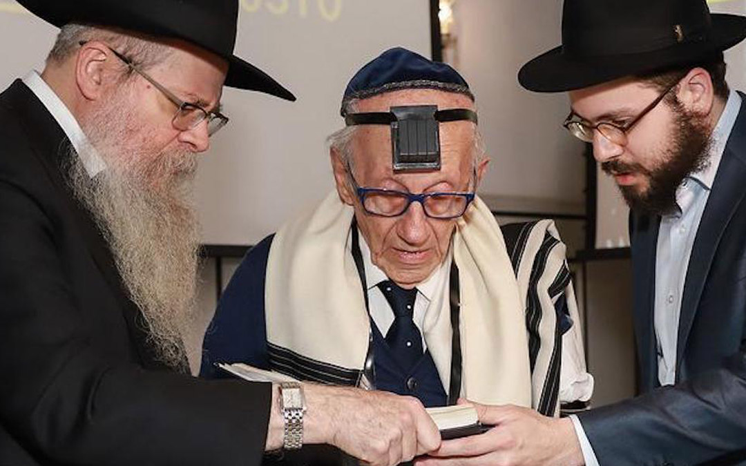 Andor Stern (center) is shown at his bar mitzvah with Rabbi David Weitman (left) and Rabbi Toive Weitman