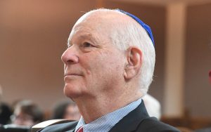 Sen. Benjamin L. Cardin listens to a speaker at the Beth Am rededication ceremony. (Photo by Jim Burger)