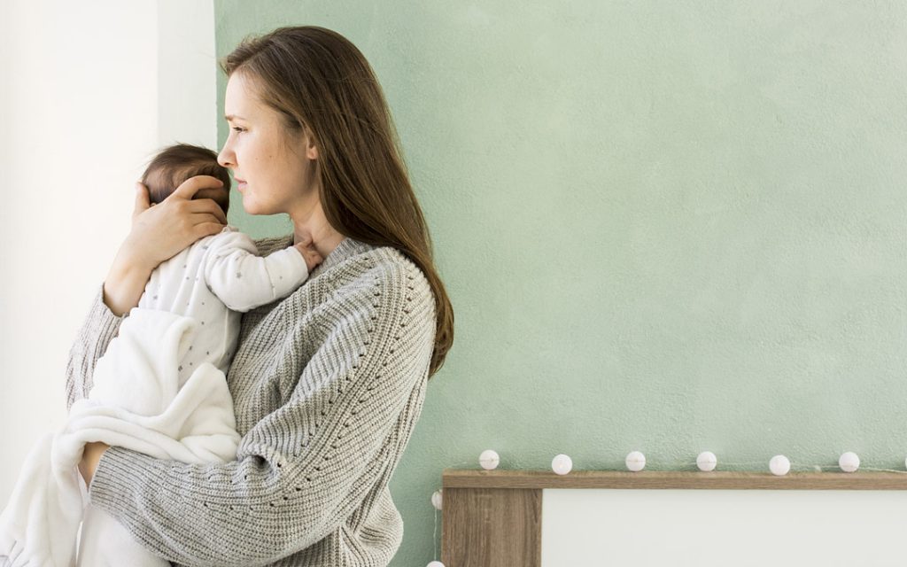 Mother holding baby