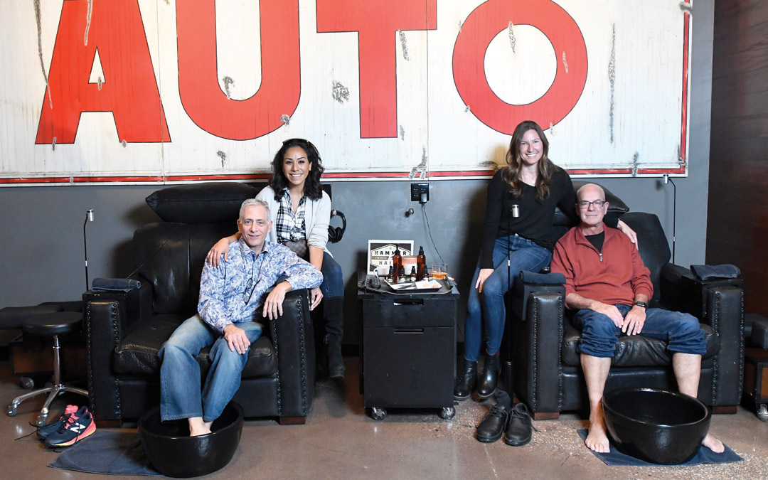 (Left to right) Ariel Lewis and her dad Scott Cooper and Aliza Friedlander and her dad Elliot King recently visited the now defunct Hammer & Nails Grooming for Guys. (Photo by Steve Ruark)
