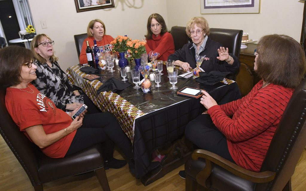 Members of the book club celebrate 20 years of reading the classics and other books of interest. (Photo by Steve Ruark)