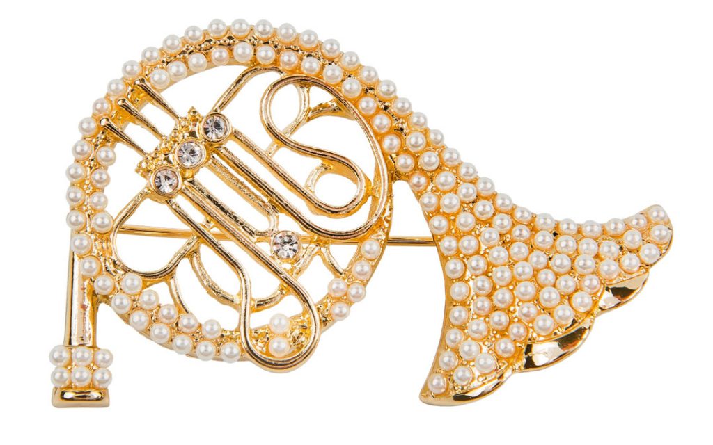 A pearl and horn pin will take your outfit from ordinary to extraordinary. $49.50 at Chico’s