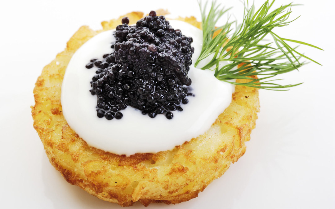 A latke topped with caviar (Getty Images)