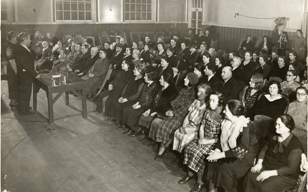 Adult immigrants take a class at the Jewish Educational Alliance in East Baltimore in August of 1935.