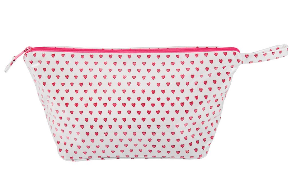 Take this heart-patterned cosmetic case on that romantic Valentine’s Day getaway. Cosmetic Case from Becket Hitch; Roller Rabbit, $68.