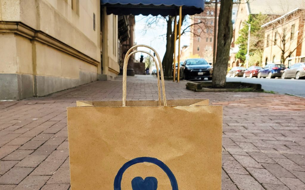 Hotel Revival in Mount Vernon is offering bagged lunches and produce from the hotel’s rooftop restaurant Topside to anyone in need.