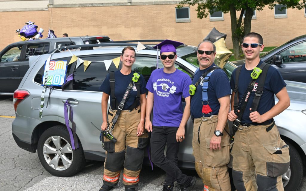 Heroes in our Midst: Members of the Pikesville Volunteer Fire Company turn out to cheer for the graduating seniors. (Photo by Michael Schwartzberg/PVFC)