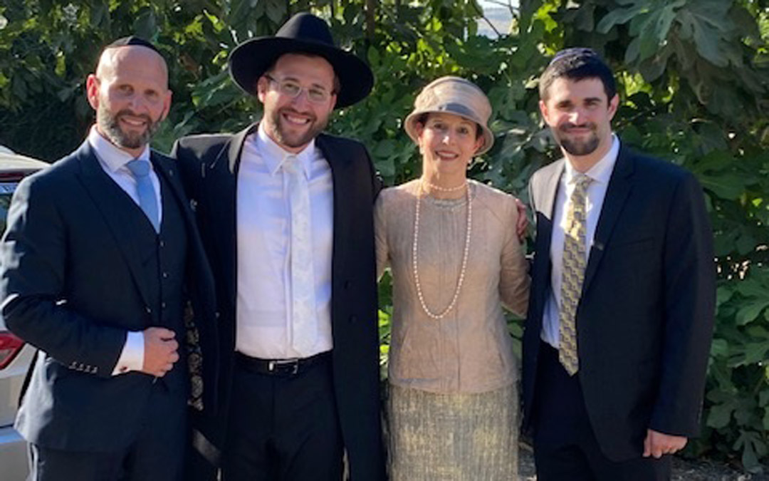 (from left to right) Mitch Greenberg, the groom Yosef Pesach Greenberg, Melinda Michel and Daniel Greenberg