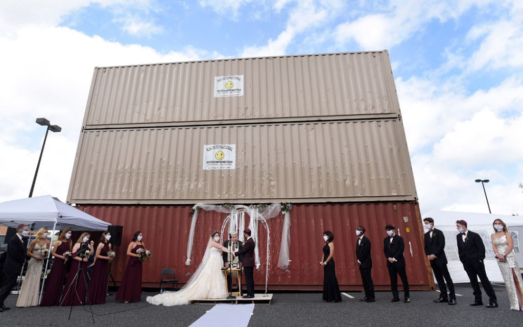 The wedding party gathers before God and the big screen at Horizon Cinemas Fallston