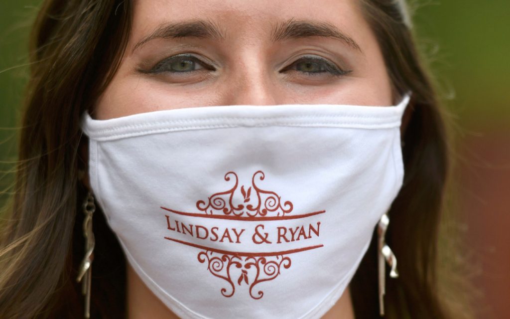 Among the wedding party favors were face masks bearing the names of the bride and groom.