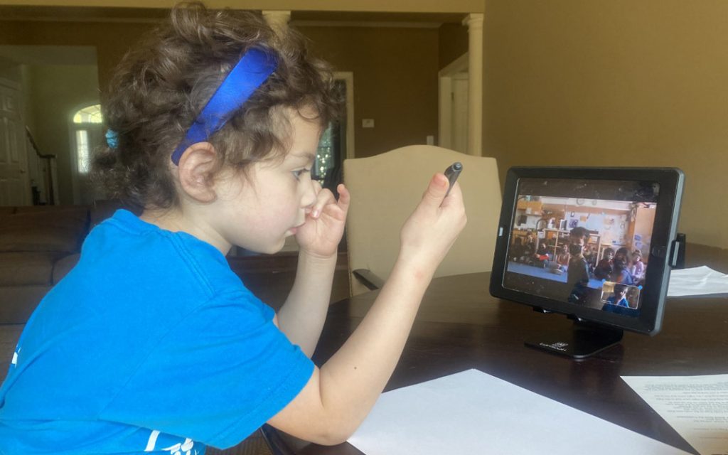 Emily, Class of 2034, Zooms into class for morning meeting.