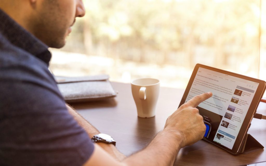 man at computer screen