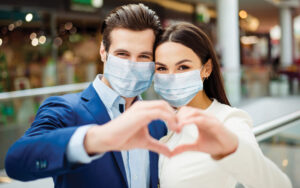 young couple in masks