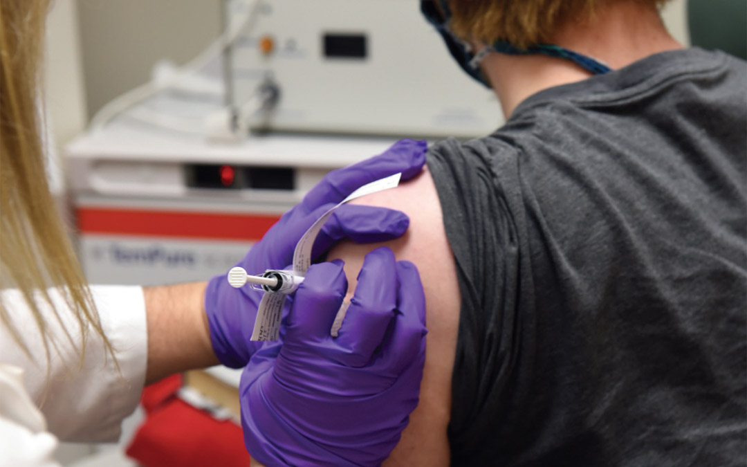 The first person injected with a trial COVID-19 vaccine by the Center for Vaccine Development and Global Health(CVD) in early May 2020 was a volunteer University of Maryland School of Medicine (UMSOM) graduate student.