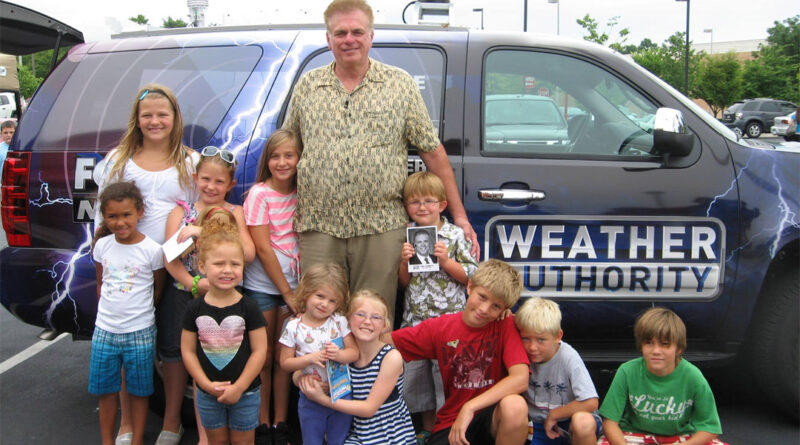 Tony Pagnotti (center) hangs out with some young fans and friends.