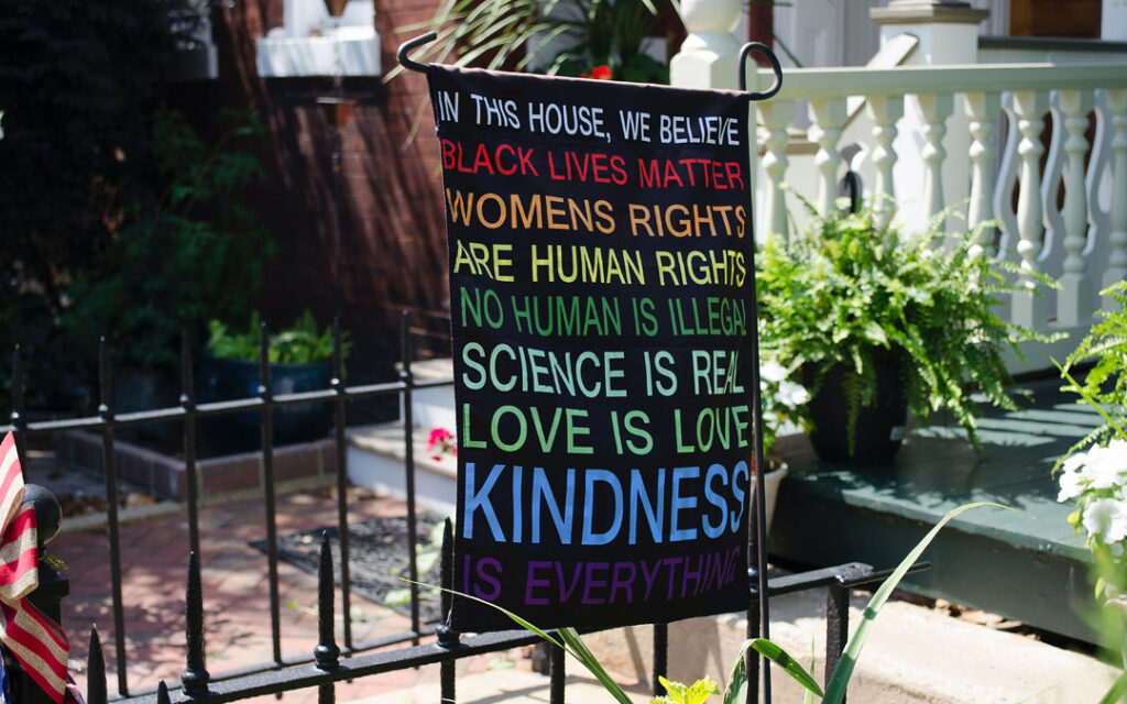 in this house sign