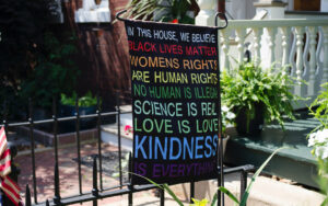 in this house sign