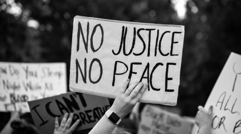 no justice no peace sign