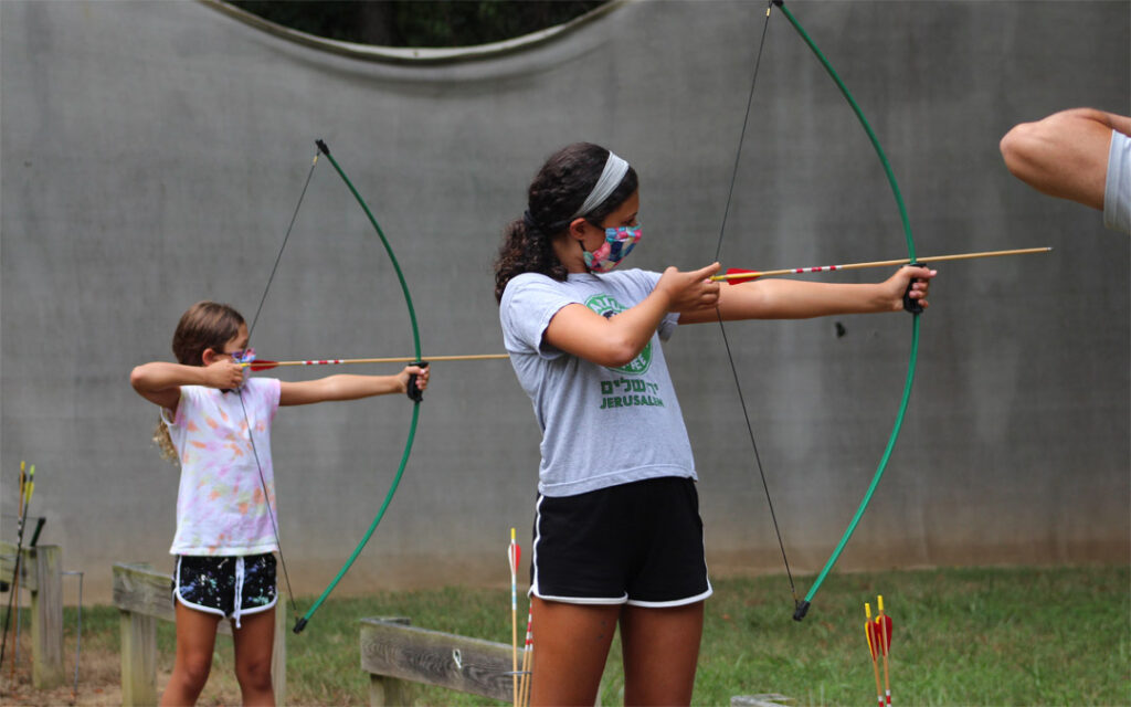 Campers at Capital Camps in Waynesboro, Pa., brush up on their archery skills.