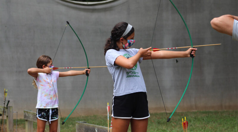 Campers at Capital Camps in Waynesboro, Pa., brush up on their archery skills.