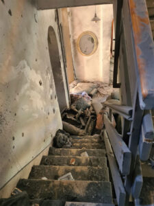 Stairwell in Ariely's home after a rocket attack