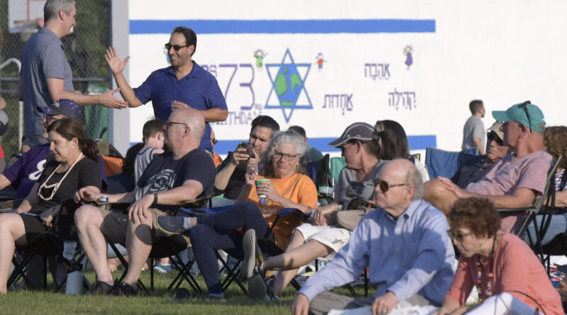 A crowd enjoys Chizuk Amuno Congregation's SummerFest.