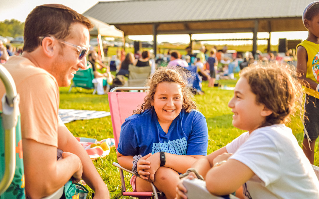 Friends and family gather at the Summer Music Fest.