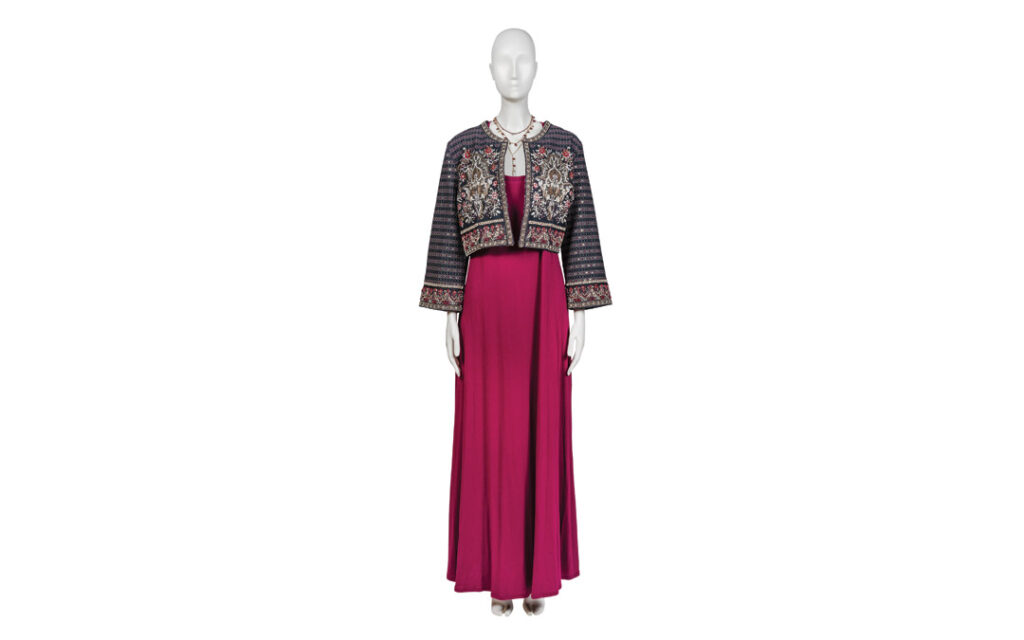 Santiago Dress in Purple Potion, under a Topper Jacket in Mandala Black, paired with a two-line Layered Necklace with Garnet in Maroon from Soft Surroundings