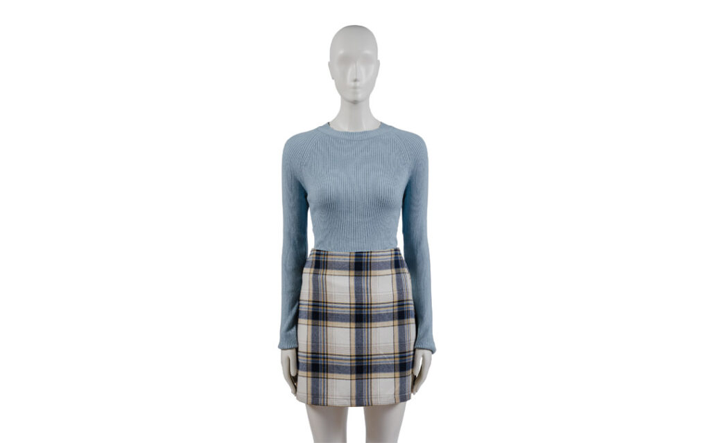 Twist Back Long Sleeve Pullover Sweater in Powder (Navy) Blue, paired with a Navy Aline Plaid Skirt from Francesca’s