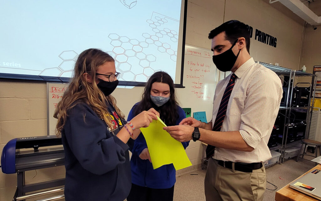 Beth Tfiloh tenth grade students consult with Director of STEM Education Vince Bonina.