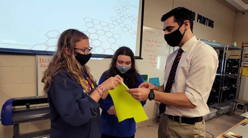 Beth Tfiloh tenth grade students consult with Director of STEM Education Vince Bonina.