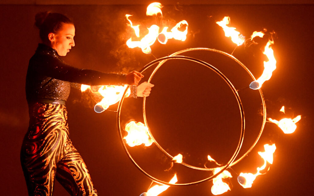 A member of The Dancing Fire performs during "Illumination Celebration: Chanukah Ignited" at the Owings Mills JCC. (Photo by Steve Ruark)