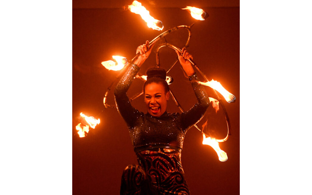 A member of The Dancing Fire performs during "Illumination Celebration: Chanukah Ignited" at the Owings Mills JCC. (Photo by Steve Ruark)