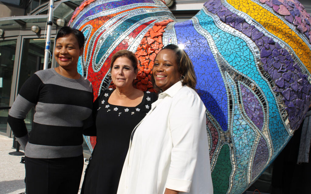 Joanne Brooks, Randi Pupkin, Savonne Ferguson at the Art with a Heart unveiling.