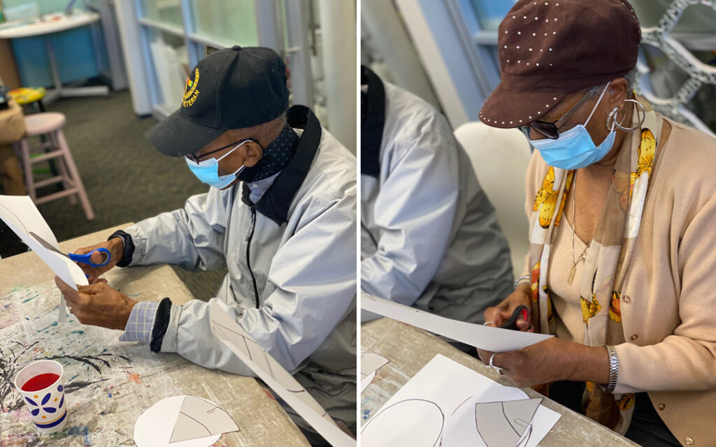 Atrium Village residents spent time with volunteer high school students at Art with a Heart painting flowers for a mural to be placed at My Sister's Place Women's Center in Baltimore.