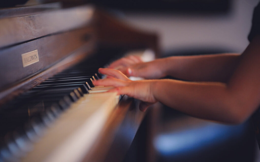 child playing piano