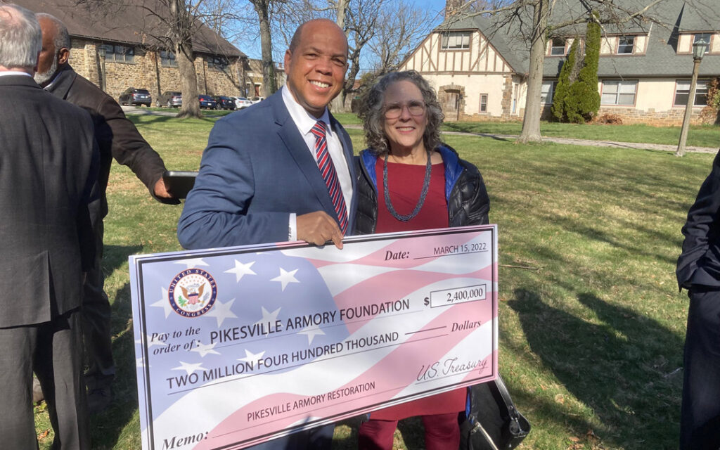 Pikesville Armory Foundation President Shelley Morhaim celebrates the federal grant with Baltimore County Council President Julian E. Jones Jr. (Provided photo)