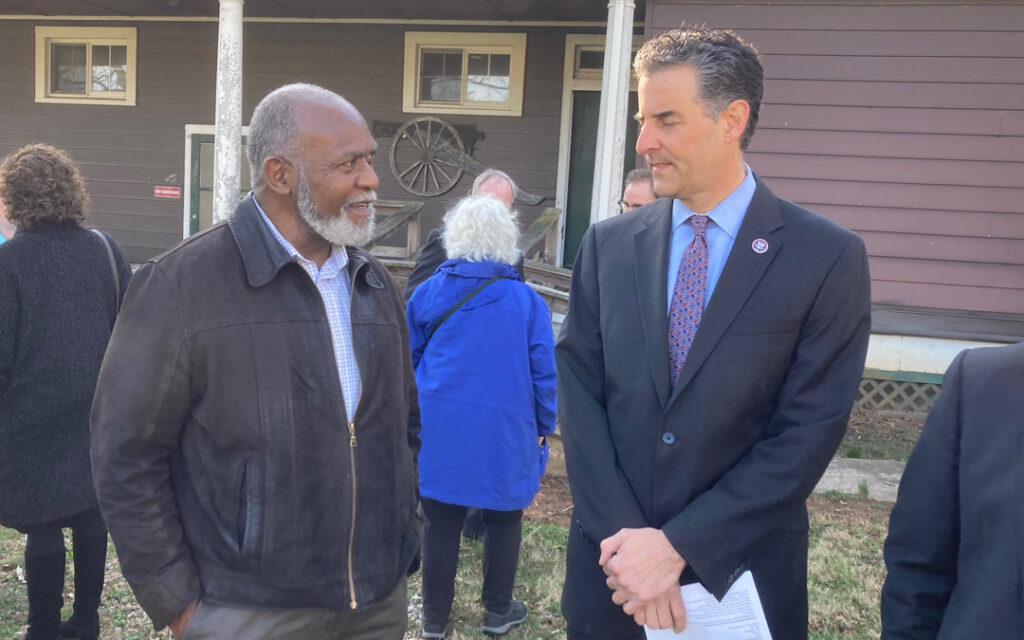 Rep. John Sarbanes (right) chats with a Pikesville Armory Foundation supporter. (Provided photo)