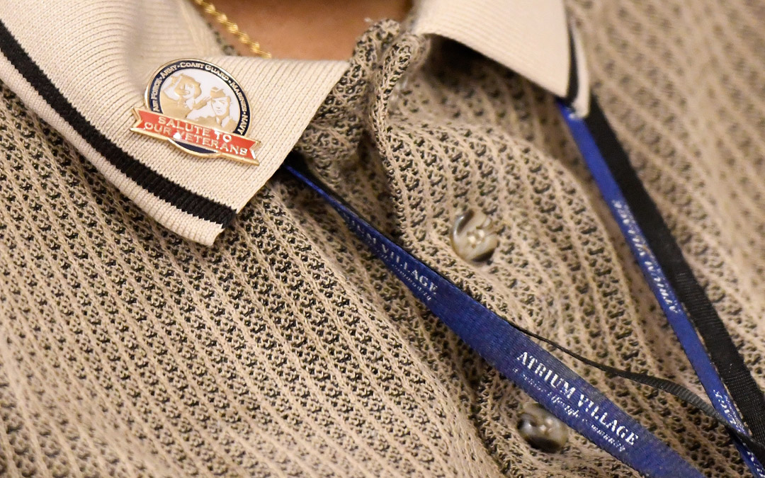 One of the honored veterans wears a pin he received during the luncheon in honor of his service to his country.