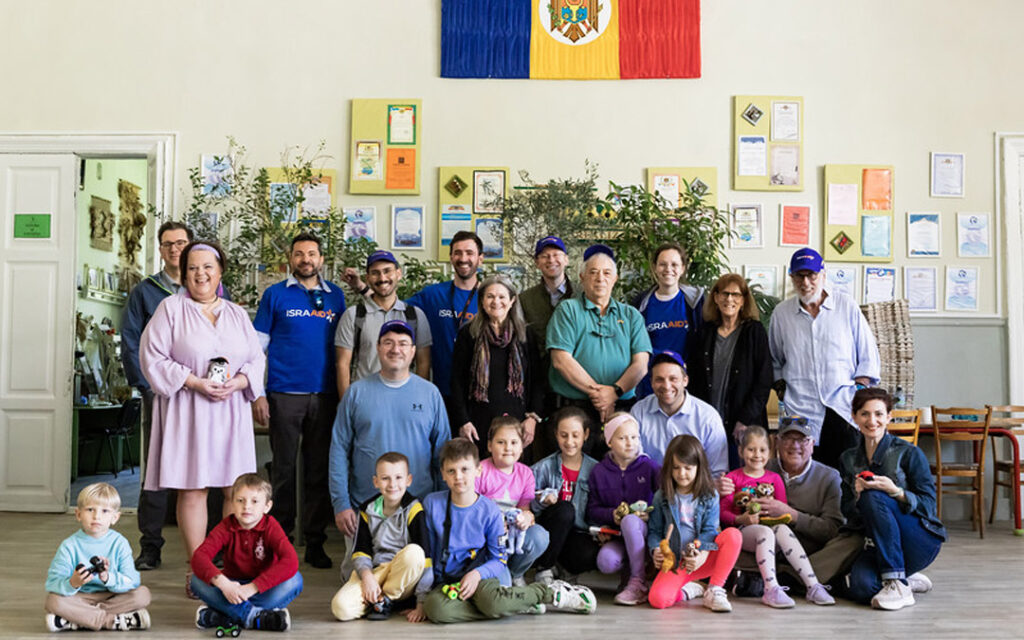 Beth Tfiloh congregants gather with Ukrainian refugee children and others in Moldova