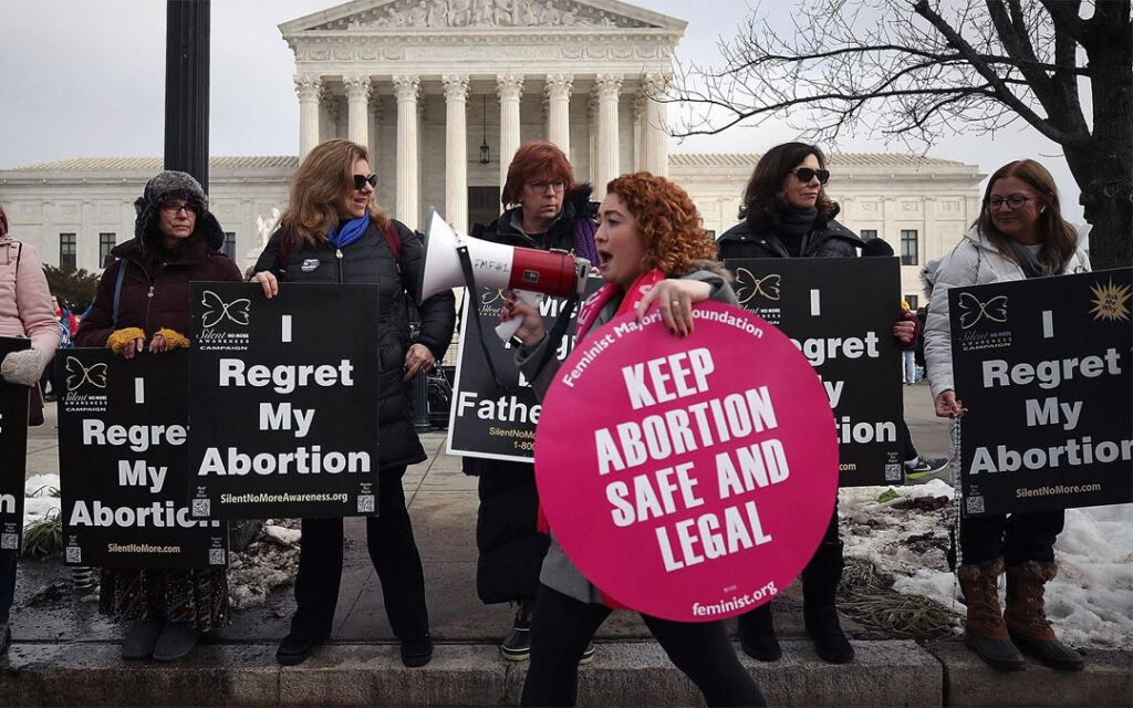 Protesters on both sides of the abortion issue gather in front of the U.S. Supreme Court building during the Right To Life March in Washington D.C., on Jan. 18, 2019.