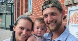 Aryeh Wolf with his wife, Mindy, and daughter, Zahava