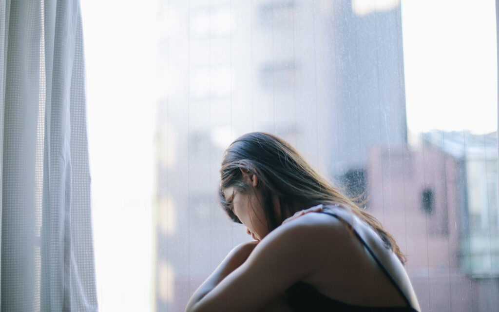 woman at window