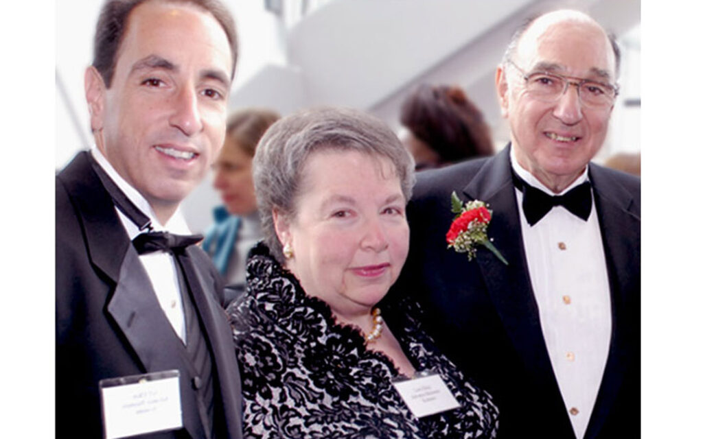 In this undated photo, Lois S. Elkin is flanked by her husband, Alan (right), and her son, Jeff.