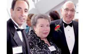 In this undated photo, Lois S. Elkin is flanked by her husband, Alan (right), and her son, Jeff.
