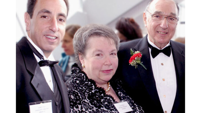 In this undated photo, Lois S. Elkin is flanked by her husband, Alan (right), and her son, Jeff.