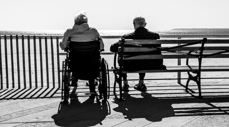 couple sitting on bench